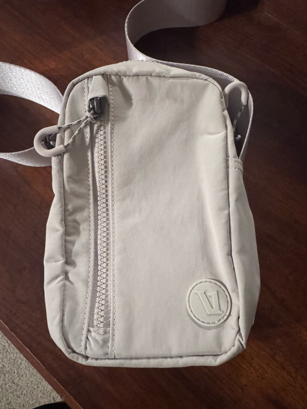 Vuori Cream Colored All Around Crossbody Belt Bag